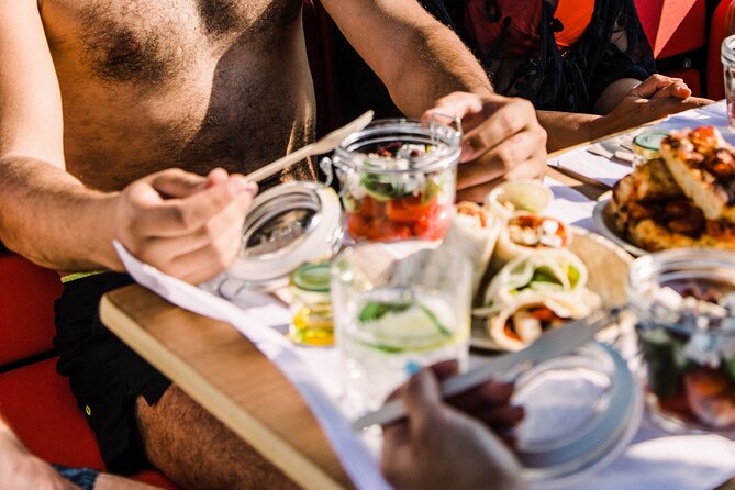Three Greek Islands Full-Day Private Luxury Boat Tour - Onboard Amenities and Activities