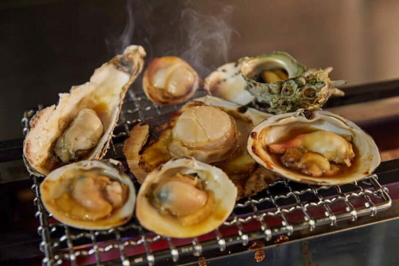 Tokyo: Japanese Experiece Dinner with Diving Ama Performance - Key Points