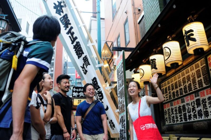 Tokyo: Shinjuku Drinks and Neon Nightlife Tour - Strolling Through Omoide Yokocho