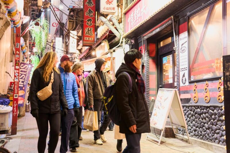 Tokyo: Shinjuku Night Walking Tour & Secret Backstreets - Experiencing Unique Restaurants and Vending Machine Drinks