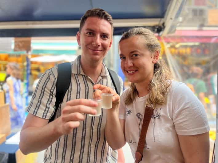 Tokyo: Tsukiji Fish Market Food and Walking Tour - Taking in the Bustling Tsukiji Fish Market