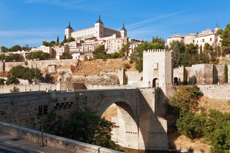 Toledo: History of the Three Cultures Guided Walking Tour - Arco De La Sangre