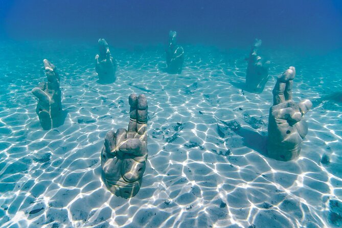 Top Isla Mujeres Catamaran Tour With Snorkel Open Bar and Buffet Lunch - Confirmation Details