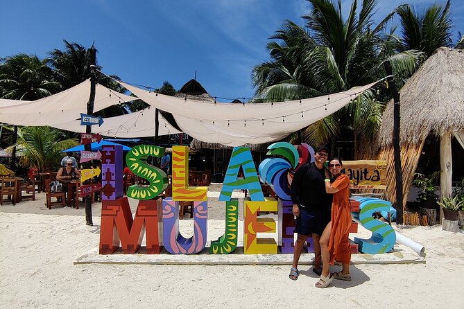 Top Isla Mujeres Catamaran Tour With Snorkel Open Bar and Buffet Lunch - Pricing and Guarantees