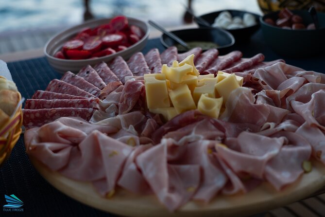 Tour of Apericena at Sunset and Dinner on Boat - Pricing and Booking Details