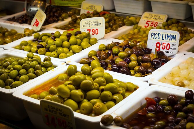 Tour Paella and Malaga Market With an Official Guide - Accessibility and Dietary Options