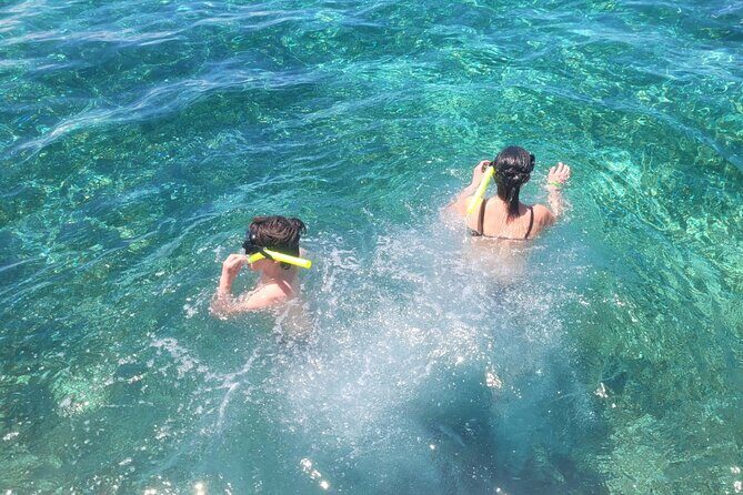 Tour to Cozumel by Catamaran with Snorkeling and Buffet Lunch - The Sum Up