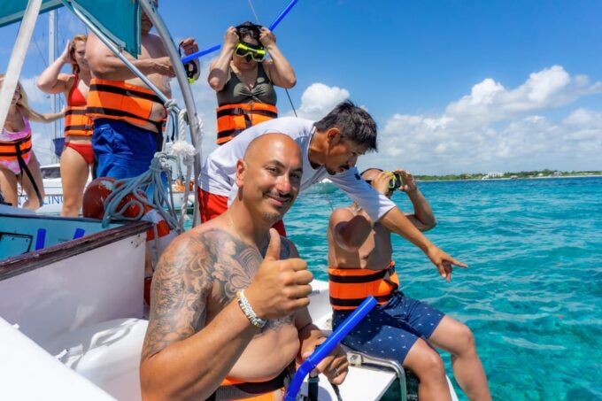 Tour to Isla Mujeres With Open Bar Departure at Noon - Departure Time and Location