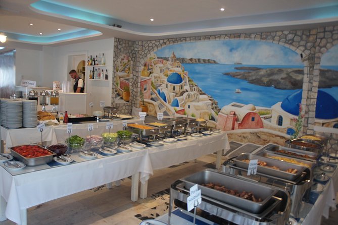 Traditional Greek Night Live Music & Dinner Show in Santorini - Participatory Greek Folk Dances