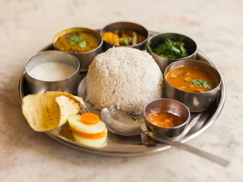 Traditional Nepali Thali Dining at AtomiX Bar and Grill - Experience Overview