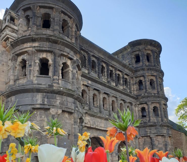 Trier: Guided City Walk With Wine Tasting - Exploring Roman Ruins