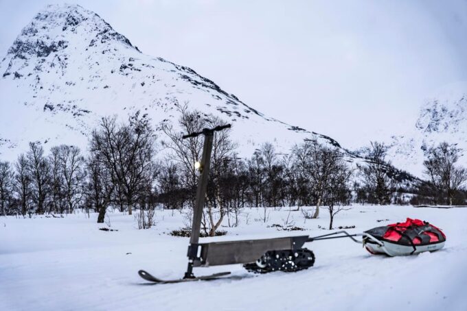 Tromsø Day: Electric Snow Scooter Ride & Bonfire With Guide - Enjoying the Bonfire