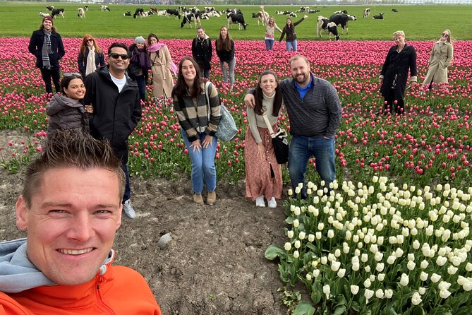 Tulip Field With a Dutch Windmill Tour From Amsterdam - Discovering Dutch Culture
