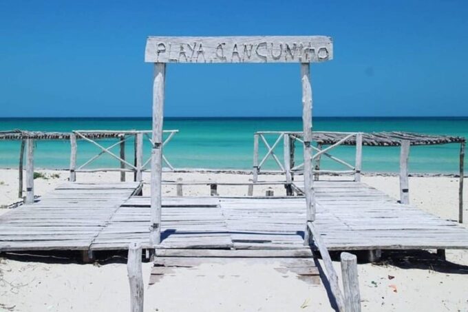 Tuquesa: Las Coloradas, Ria Lagartos, and Merida Beach Tour - Return Location
