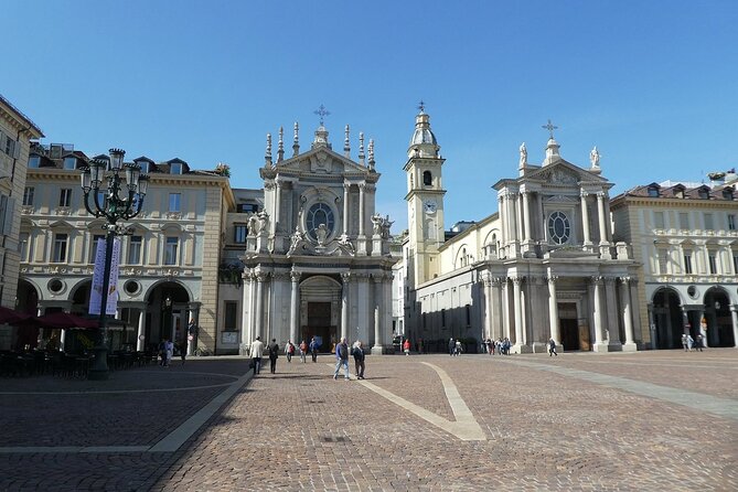 Turin Highlights Private Walking Tour With Piazza Castello and Piazza San Carlo - Navigating Porto Palatina