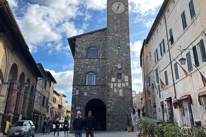 Two Wine Tastings and Visit to a Historic Cellar Inside Old Walls of Montalcino - Guided Tasting in Historic Winery