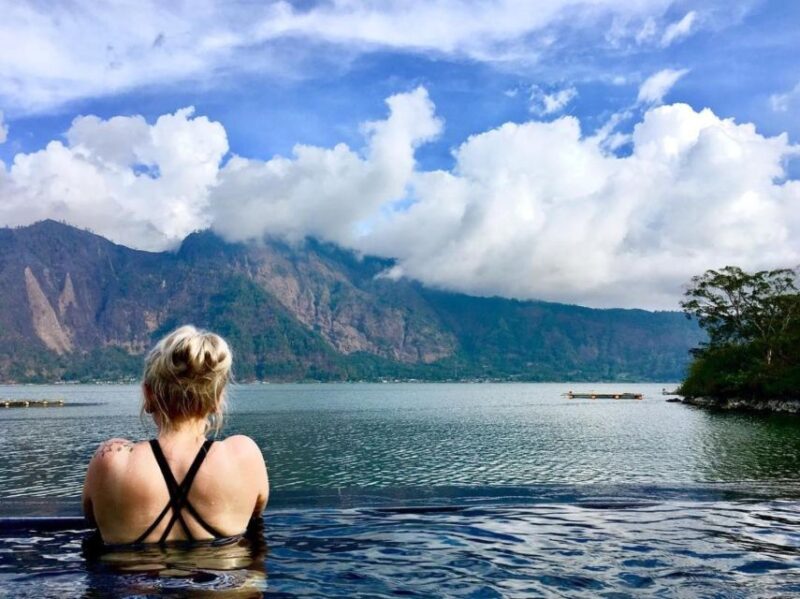 Ubud: Mount Batur Jeep Sunrise and Natural Hot Spring Tour - Exploring Black Lava Fields