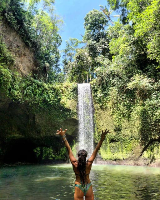 Ubud: Tirta Empul, Rice Terrace and Waterfall Tour - Visiting Tibumana Waterfall