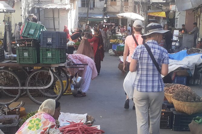 Udaipur Heritage City and Local Market Walking Tour - Meeting and Pickup