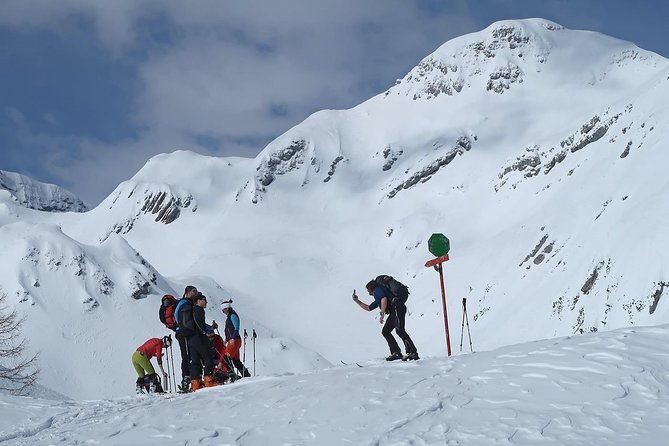 Unforgettable Ski Touring Traverse-Snowy Embrace of Triglav National Park - Carving Through Winter Wonderland