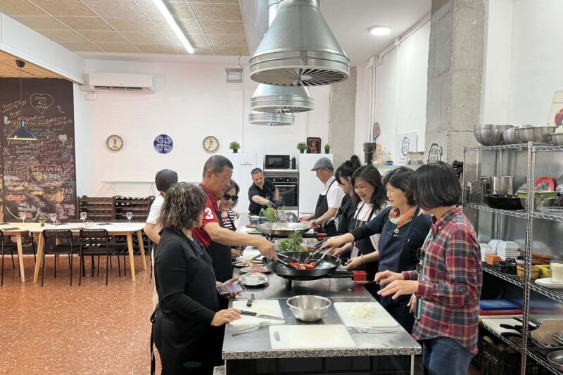 Valencia: Paella Workshop, Tapas and Ruzafa Market Visit - Authentic Paella Cooking Experience