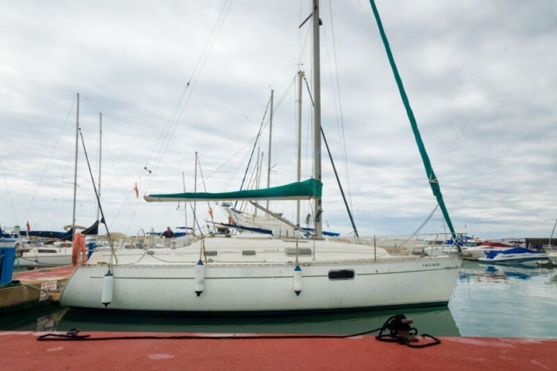 Valencia: Private Sailing Trip With Snacks and Drinks - Sightseeing and Swimming