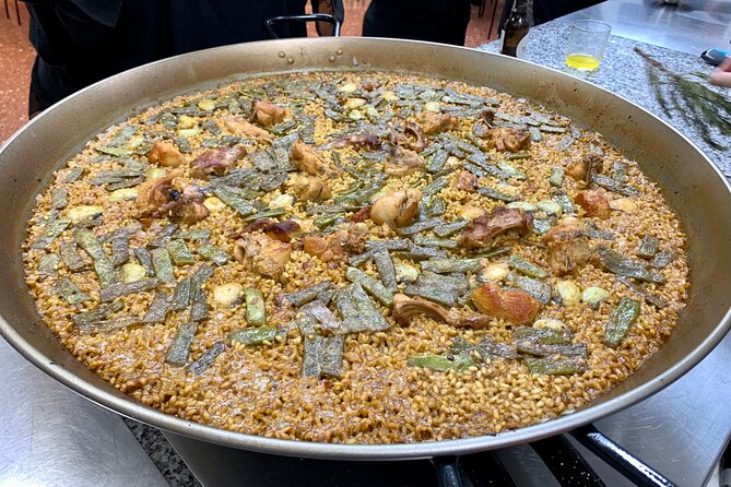 Valencian Paella Cooking Class, Tapas and Visit to Ruzafa Market. - Exploring the Ruzafa Market