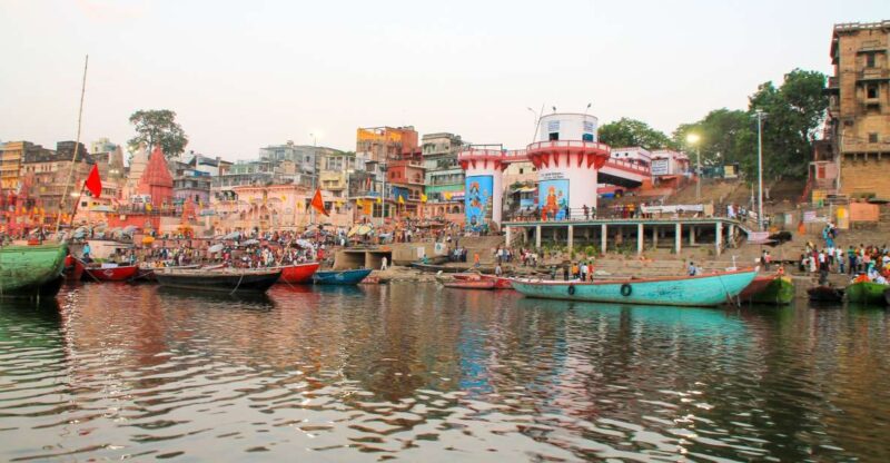 Varanasi: Morning Guided Boat Ride With Yoga - Key Points