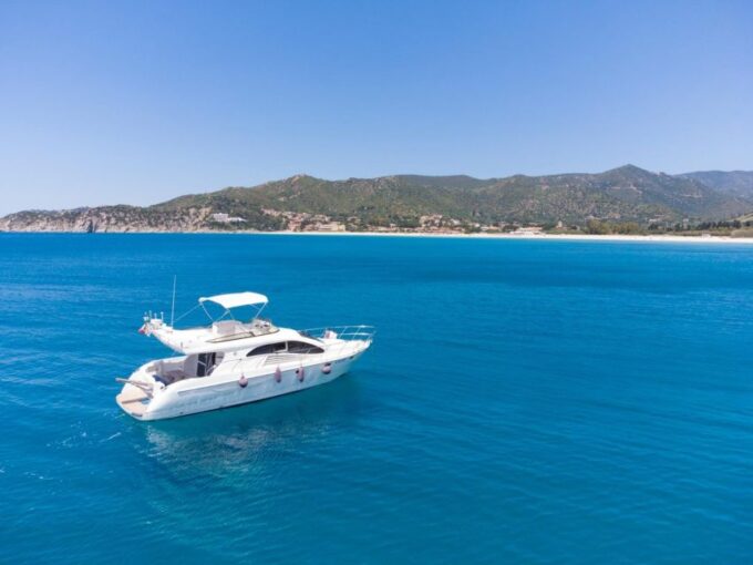 Villasimius: Day Yacht Cruise With Aperitif and Lunch - Aperitif, Lunch, and Beverages