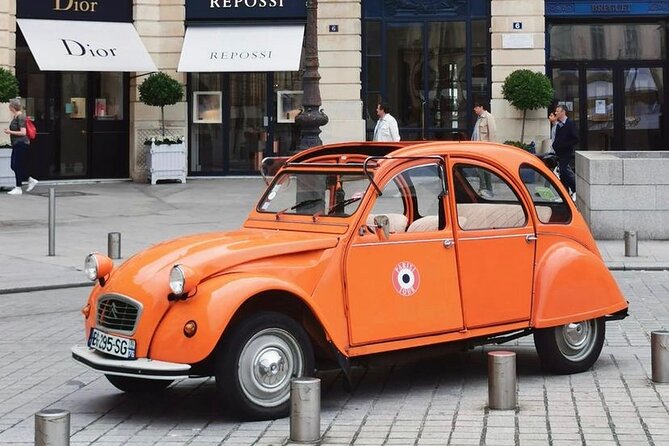 Vintage 2CV Adventure: 1-Hour Paris Highlights Tour - French Music During the Tour