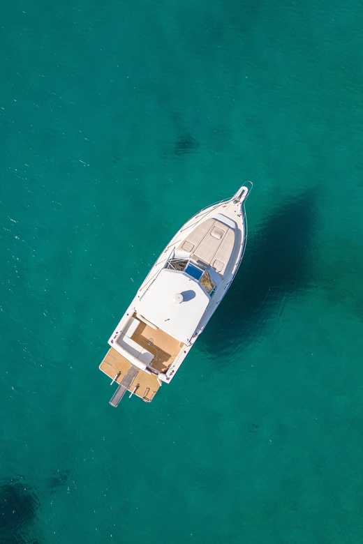 Vlichada Port: Private Boat Cruise With Swim Stops & Drinks - Key Points