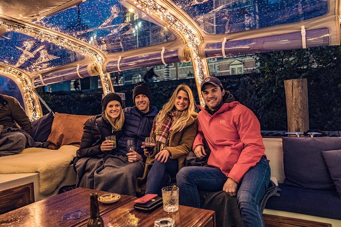 Voyage Amsterdam 2 Hour Evening Cruise With Live Guide and Bar - Exploring Amsterdam by Boat