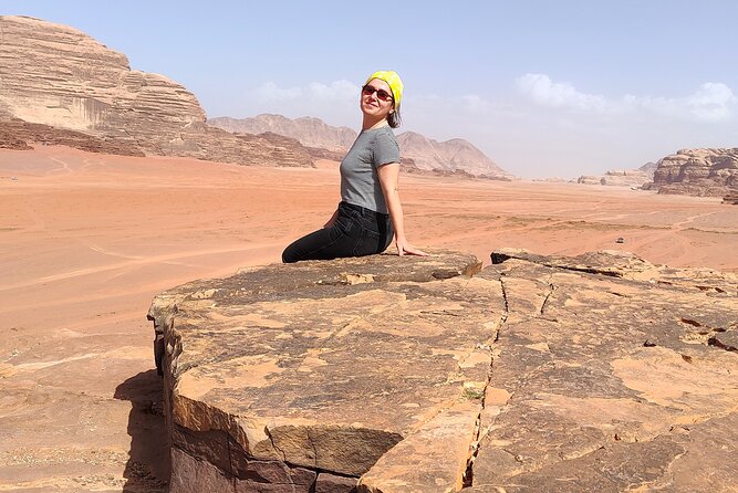 Wadi Rum Day Tour & Starlight Cave & Traditions Food - Meeting and Pickup