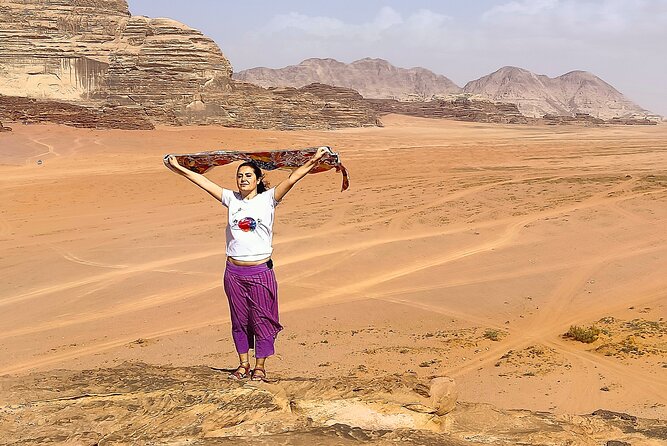 Wadi Rum Day Tour & Starlight Cave & Traditions Food - Sand Boarding
