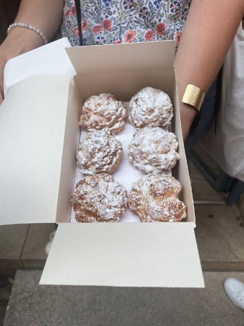 Walking Tour in Bordeaux With Tastings and Stories - Exploring Porte Dijeaux