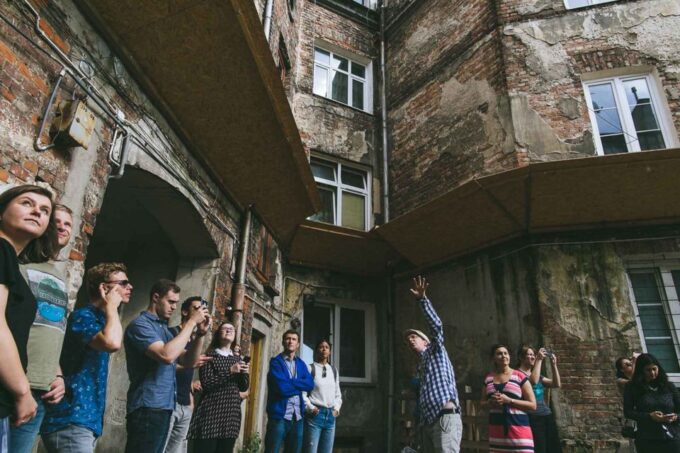 Warsaw: WWII Private Tour by Retro Minibus With Hotel Pickup - Archival Photographs and Stories