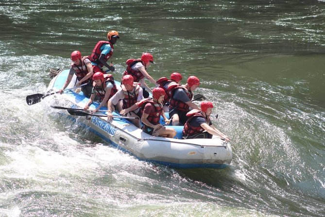 White Water Rafting in Zimbabwe - Raft Maneuvering and Guest Participation