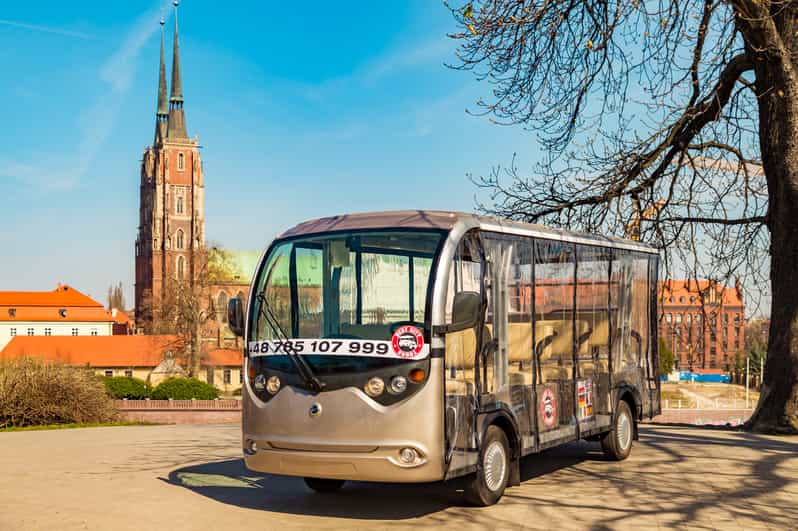 Wroclaw: 1-Hour Sightseeing Tour by Electric Car - Audio Guide and Languages