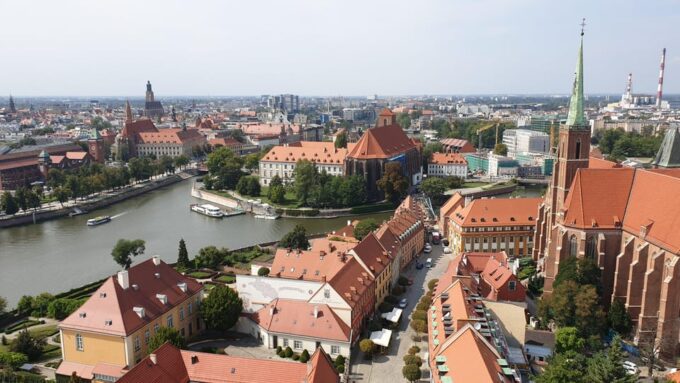 Wrocław: 2-Hour E-Bus Tour With Licensed Guide, 13-15 People - Frequently Asked Questions