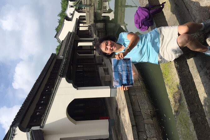 Wuzhen Water Town Delight Tour With Riverside Lunch Experience - Discover Traditional Shadow Play Shows