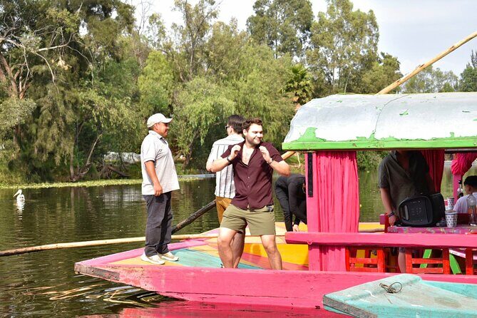 Xochimilco International boat party with open bar and tacos - Key Points