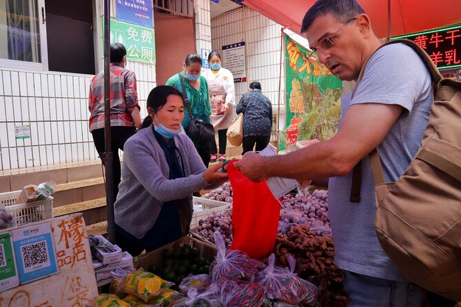 Yunnan Wet Market Wild Mushroom Hotpot Tofu Making Eco Tour - Cancellation Policy and Customer Support