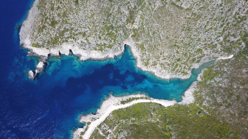 Zakynthos: West Coast & Navagio Bay Cruise With 3 Swim Stops - Swimming and Exploration Experiences