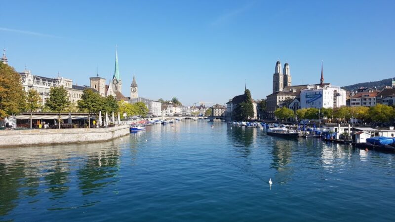Zurich Charms: Private City Center Walk and Lake Cruise - Largest Clock Face in Europe