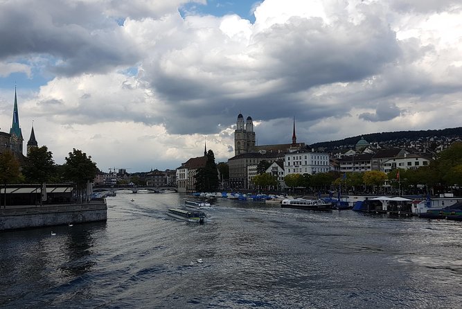 Zürich Charms Unveiled: Private City Center Walk and Lake Cruise - Taking in Zurichs Religious History
