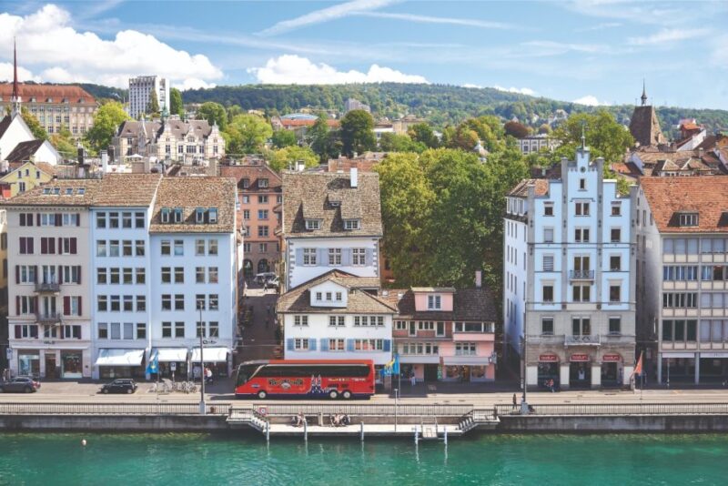 Zurich: City Bus Tour With Audio Guide and Lake Cruise - Scenic Photo Stops