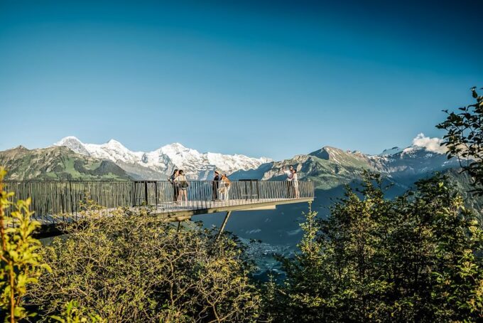 Zurich: Day Trip to Grindelwald & Interlaken by Bus & Train - Carbon-Balanced Operations
