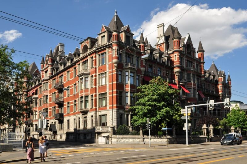 Zurich: Open Top Bus Sightseeing Tour With Optional Cruise - Audio Guide and Language Options