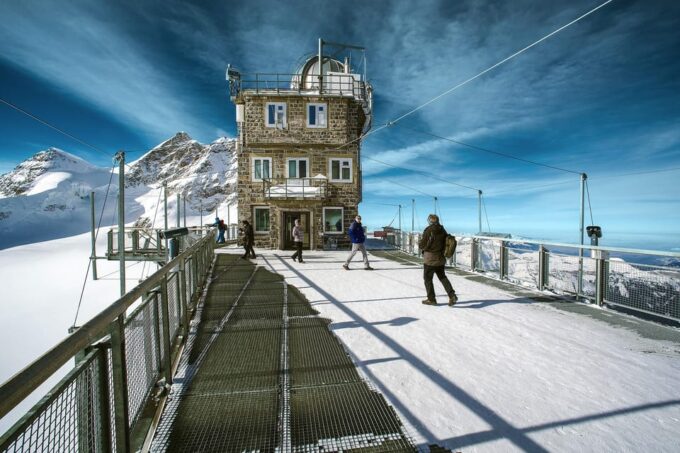 Zurich: Private Tour to Interlaken, Grindelwald & Jungfrau - Navigating the Ice Tunnel and Alpine Sensation